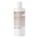 MALIN+GOETZ peppermint shampoo bottle for refreshing daily scalp cleanse.