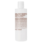 Malin + Goetz Shampoo Clarifying Peppermint bottle promotes a refreshing daily cleanse