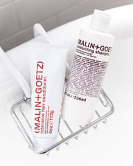 MALIN+GOETZ Neroli-Basil fragrance evokes a refreshing shower ritual.