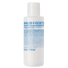 MALIN+GOETZ Vitamin E Face Moisturizer bottle close-up showing lightweight hydration
