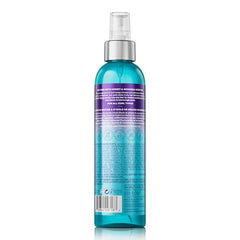 The Mane Choice atomizador refresca rizos secos para un estilo rápido.
