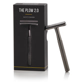MANSCAPED The Plow 2.0 brass handle close-up for premium grip.