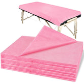 MAQIHAN pink disposable massage table sheets folded in a travel pack for easy portability