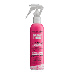 Marc Anthony Grow Long bottle pour demonstrates easy detangling.