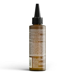 Marc Anthony Strengthening Scalp Oil being applied to damp hair for hydration.