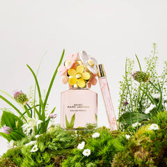 Marc Jacobs Daisy Eau So Fresh travel spray in purse-size form, easy to carry.