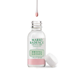 Mario Badescu Drying Lotion application on a blemish using a cotton swab