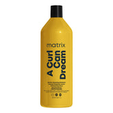 Matrix A Curl Can Dream Deep Cleansing Shampoo bottle highlighting deep cleanse for curls