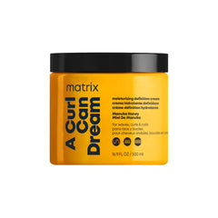 Matrix A Curl Can Dream bottle close-up demonstrates deep hydration for curls.