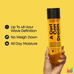 Matrix A Curl Can Dream Shampoo: brillo luminoso para rizos manejables.