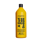 Matrix A Curl Can Dream bottle front showcasing weightless moisture for defined waves
