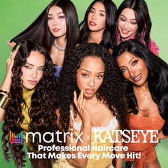 Applying Matrix Mega Sleek Conditioner demonstrates detangling ease on damp hair.