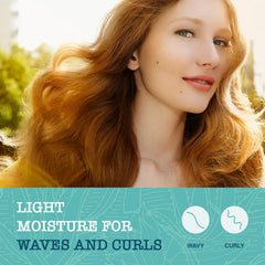Close-up of Maui Moisture lightweight hydration conditioner applied to hair.