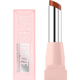 Maybelline Lifter Glaze Oil Balm Latte Crush on lips with 24-hour hydration for a glazed glow