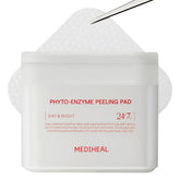 Mediheal Phyto-Enzyme peeling pad texture close-up showing gentle exfoliation.