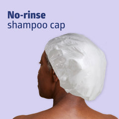 Medline ReadyBath cap in use for water-free hair cleansing.