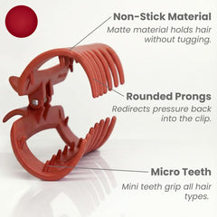 MELLO red squishy claw clip held in hand for flexible, pinch-free styling.