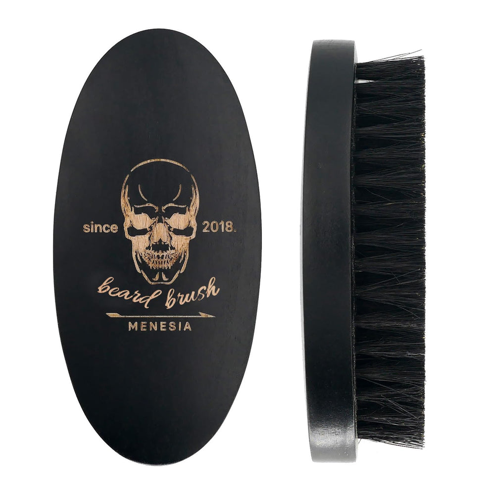Menesia black boar bristle beard brush close-up for smooth grooming.