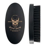 Menesia black boar bristle beard brush close-up for smooth grooming.
