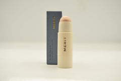 Merit Day Glow Dewy Highlighting Balm Cava swatch on skin for daytime radiance