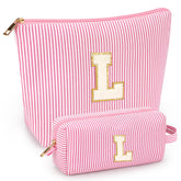 mibasies two-piece initial makeup bags in pink front view for organized travel
