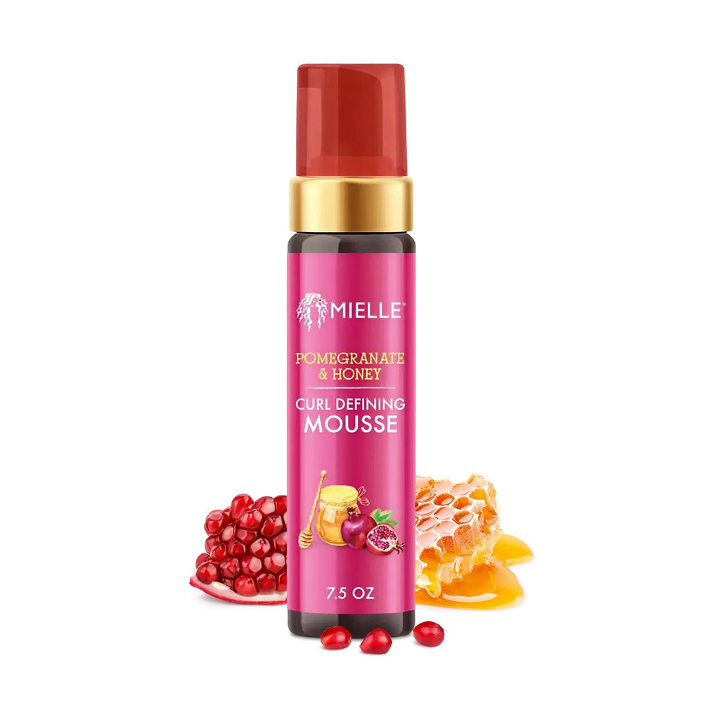 Mielle Organics Mousse Granada Miel, textura cremosa para definición de rizos.