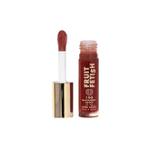 Milani Aceite Labial Fruta Fetish en botella con hidratación instantánea y brillo suave.