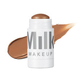 Milk Makeup Matte Bronzer Stick applied to the forehead for natural warmth