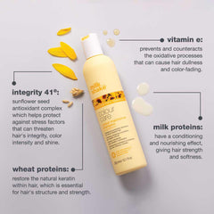 Milk Shake Color Maintainer Shampoo rich foam cleanses while protecting color.