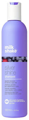 Milk Shake Silver Shine Shampoo bottle shows color-correcting formula for cooler blonde tones.