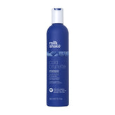 milk_shake Cold Brunette Shampoo bottle pouring blue pigments to neutralize warm brunette tones