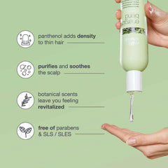 Milk_Shake Energizing Blend Shampoo label close-up highlighting botanical extracts for nourishment.