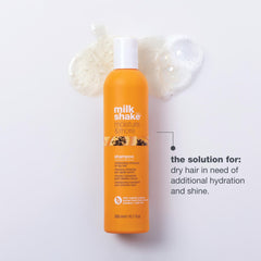 Milk_shake Moisture & More lather close-up showing creamy cleansing.