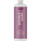 MINETAN BODY.SKIN MineTan Double Dark bottle close-up for even, deep bronze glow.