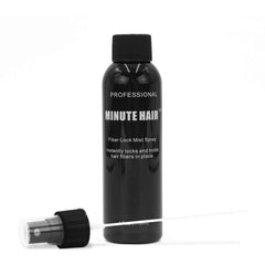 Minute Hair Fiber Lock Spray closeup label emphasizes easy-to-use, lightweight formula.