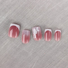 Uñas Mivota gradiente blanco-nude con diseño suave