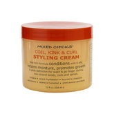 Crema Mixed Chicks para rizos definidos en la botella.