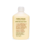 Mixed Chicks curl defining leave-in bottle shows vibrant hydration for defined curls.