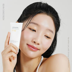 Close-up of Mixsoon Bean Sunscreen SPF 50 texture highlighting silky, non-sticky application