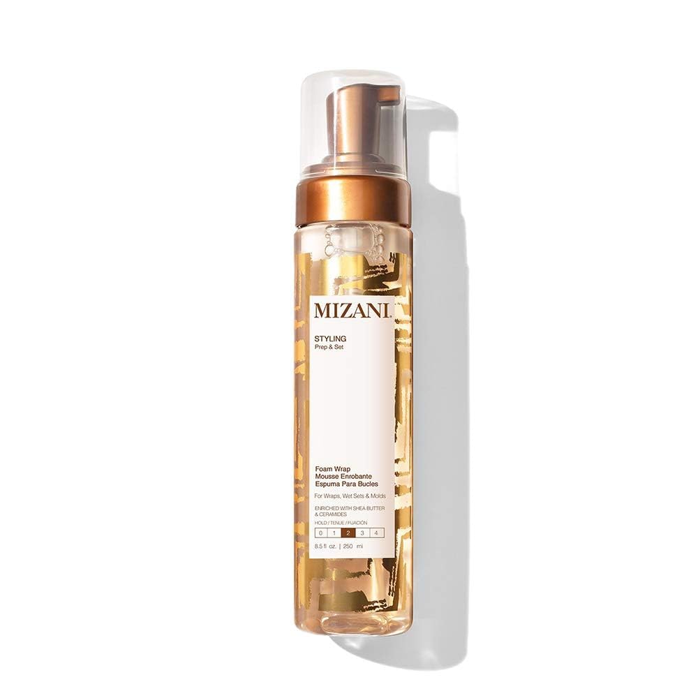 Mizani Foam Wrap bottle close-up showing moisturizing anti frizz formula