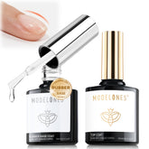 Modelones gel base goma, botella cercana para fortalecer uñas débiles.