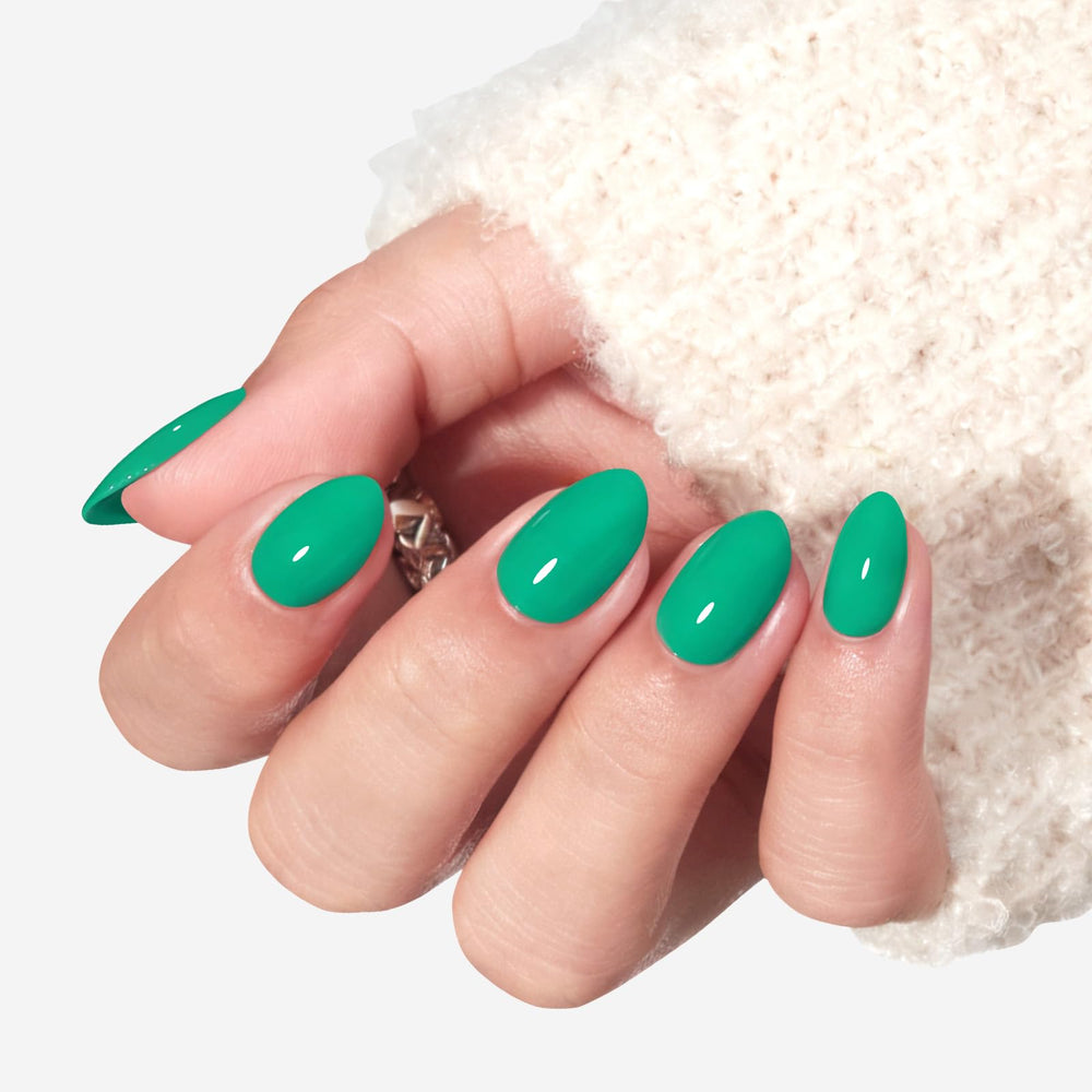 Modelones Bright Green press-on nails in packaging for quick setup and selection