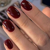 Modelones uñas postizas rojas oscuras de corte cuadrado para uso diario