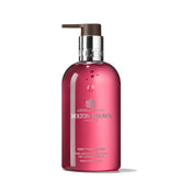 Molton Brown Fiery Pink Pepper hand wash bottle pour for daily cleansing
