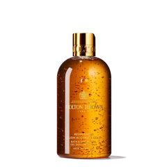 Molton Brown Mesmerising Oudh Accord & Gold bottle shines with gold flakes