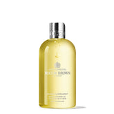 Molton Brown Orange & Bergamot bottle highlights citrus fragrance for a refreshing cleanse.