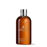 Molton Brown Re-Charge Black Pepper bottle showcases premium packaging and an energising cleanse.
