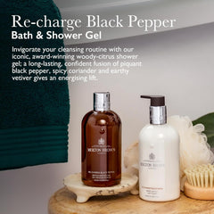 Rich lather from Molton Brown Re-Charge Black Pepper for a refreshing morning shower.