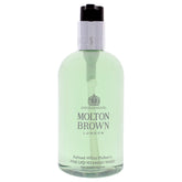 Molton Brown Refined White Mulberry bottle pour with fresh green tea scent.