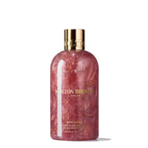 Molton Brown Rose Dunes bottle displays opulent ambery-rose scent for daily indulgence.